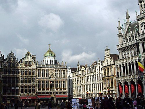 Grand Place with Belgian Flag. Brussels, Belgium.